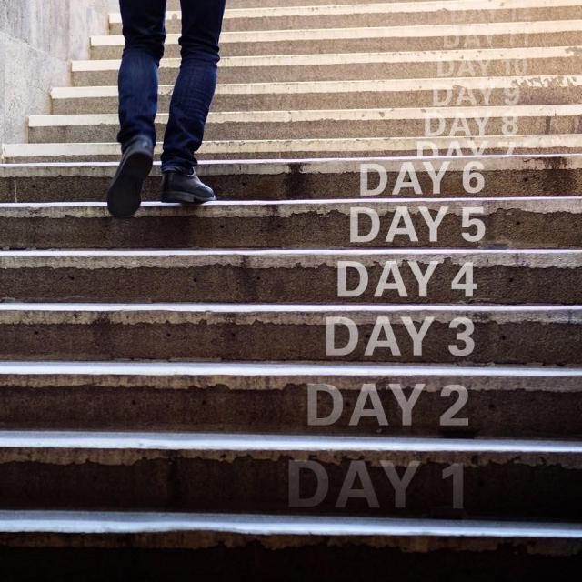 Person walking up steps with text on each step numbering the days as they climb higher